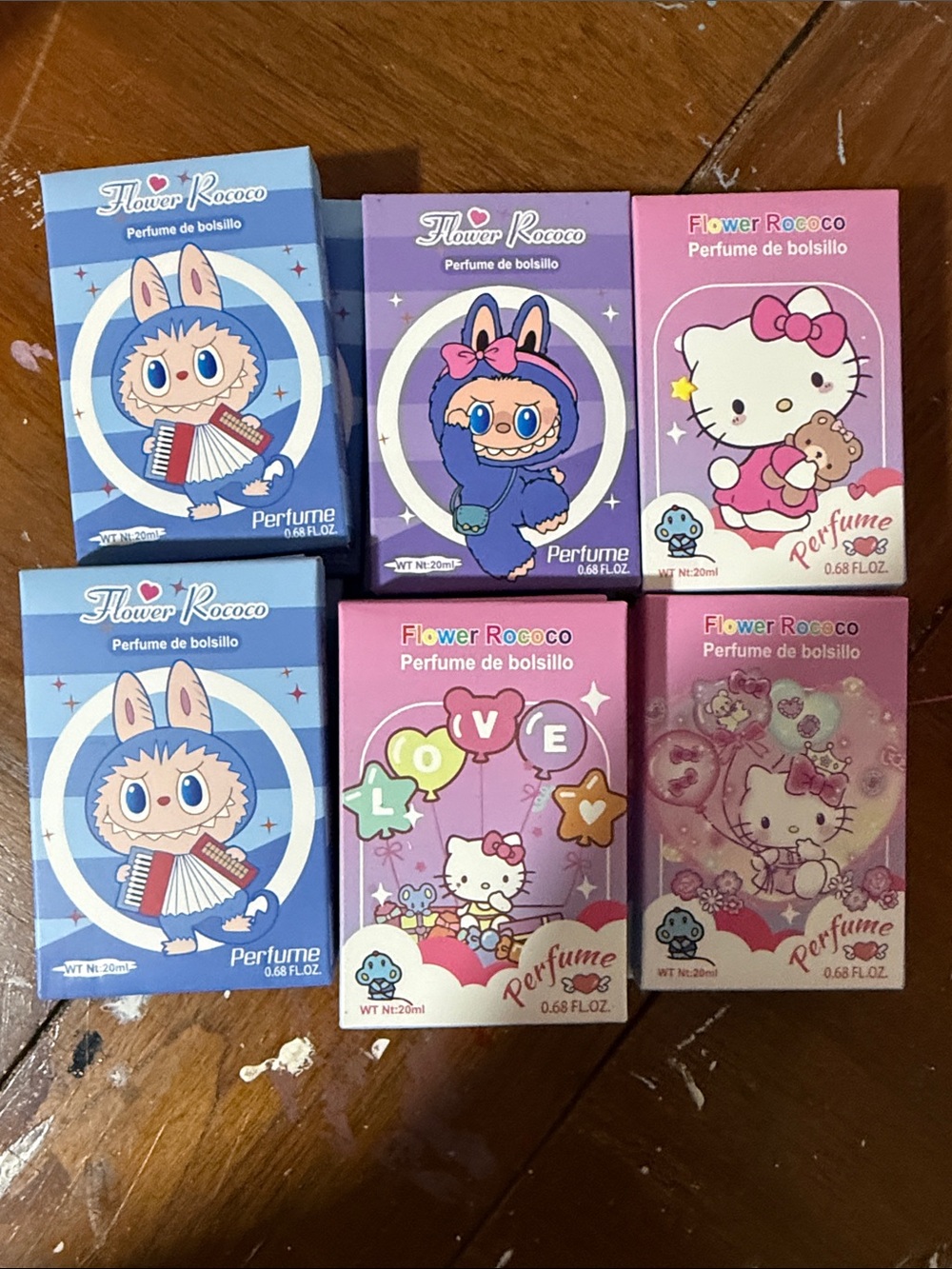 14 total Hello Kitty & Cute Character Pocket Perfume Set - Pink, Purple, Blue